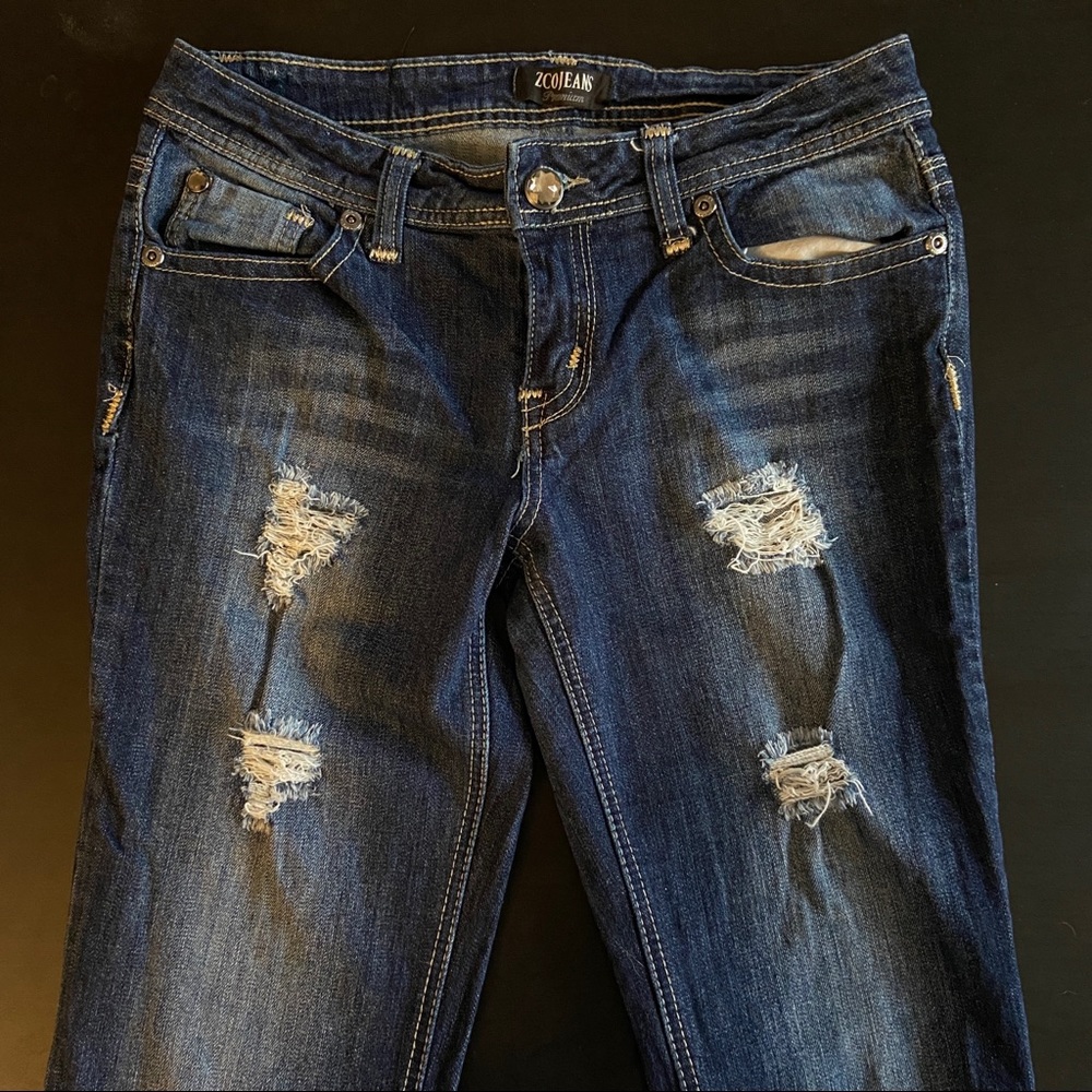 Dark wash distressed jeans